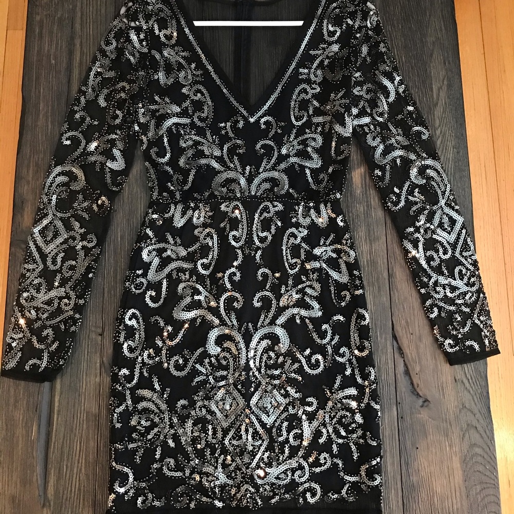 Silver bedazzled black body con dress